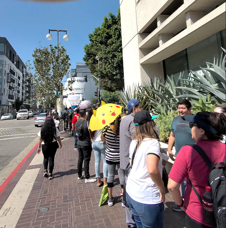 Fans lining the sidewalk for the Capcom Store opening in Little Tokyo